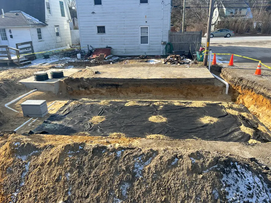 Septic tank installed next to a new foundation