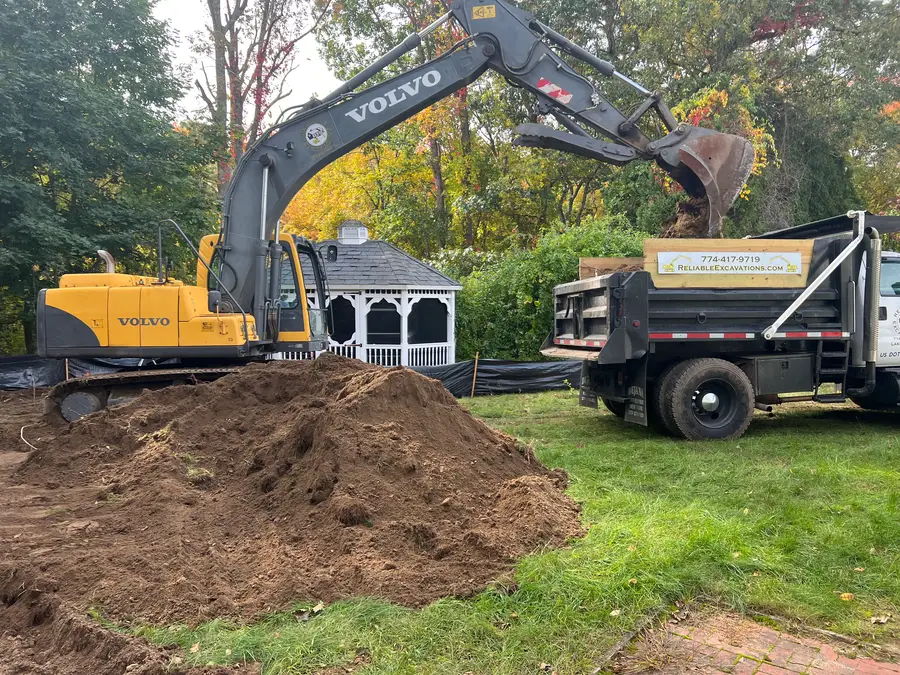 Volvo excavator loading a dump truck